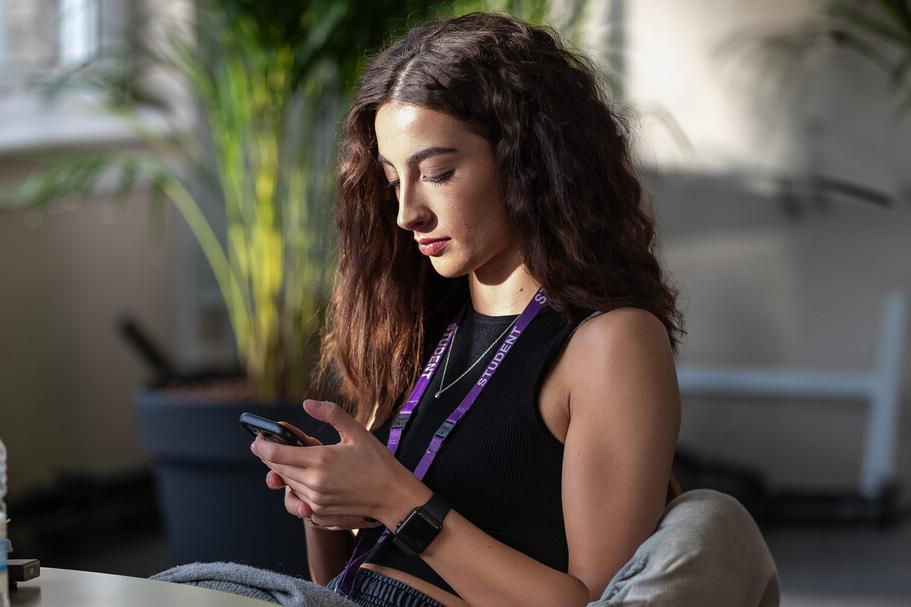 A student using their mobile phone