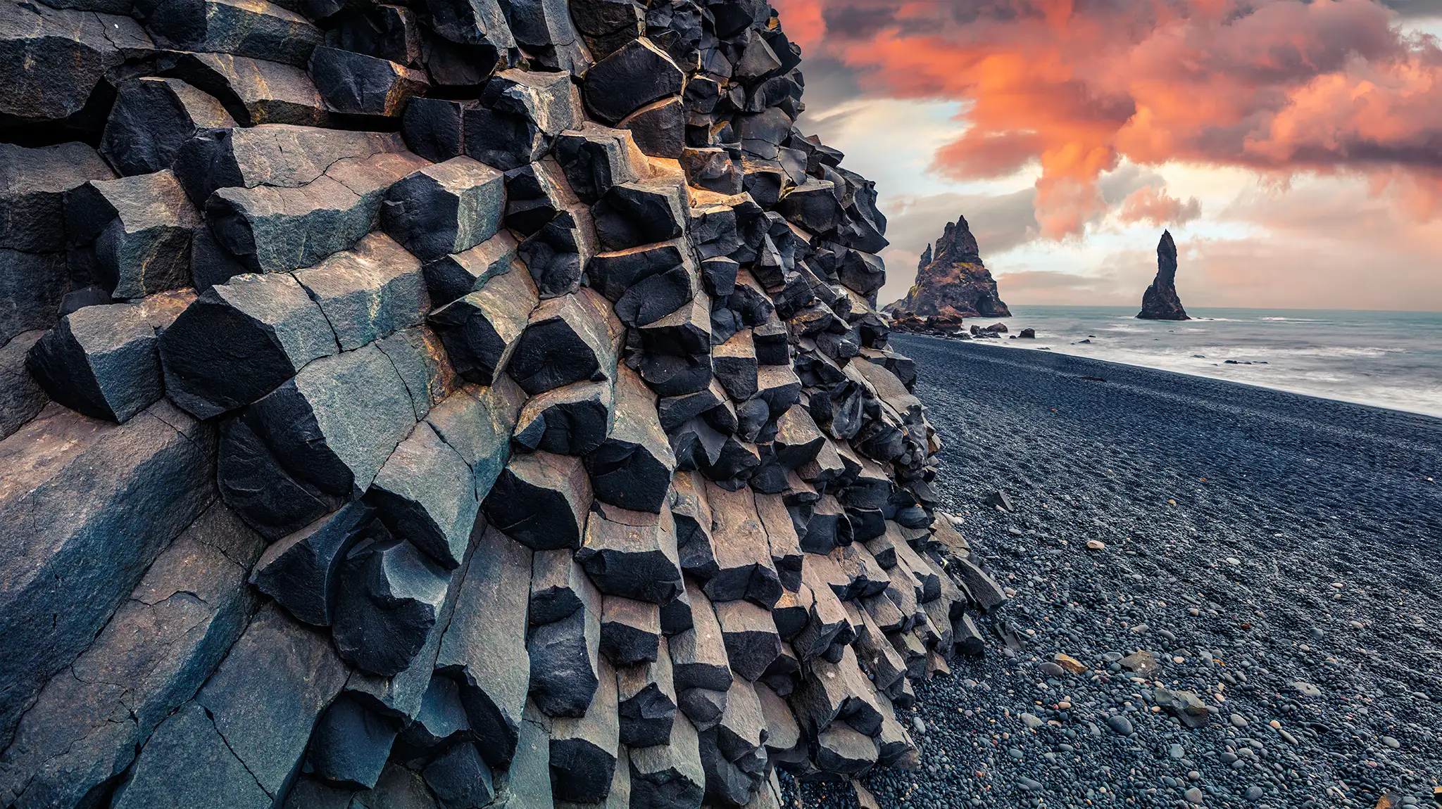 Sunset on Reynisdrangar cliffs in Iceland.