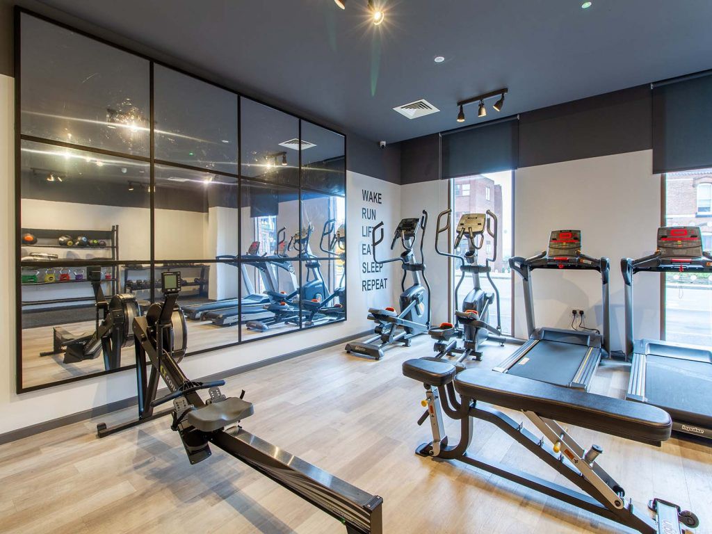 Rowing machine and cross trainers at Tudor Place gym