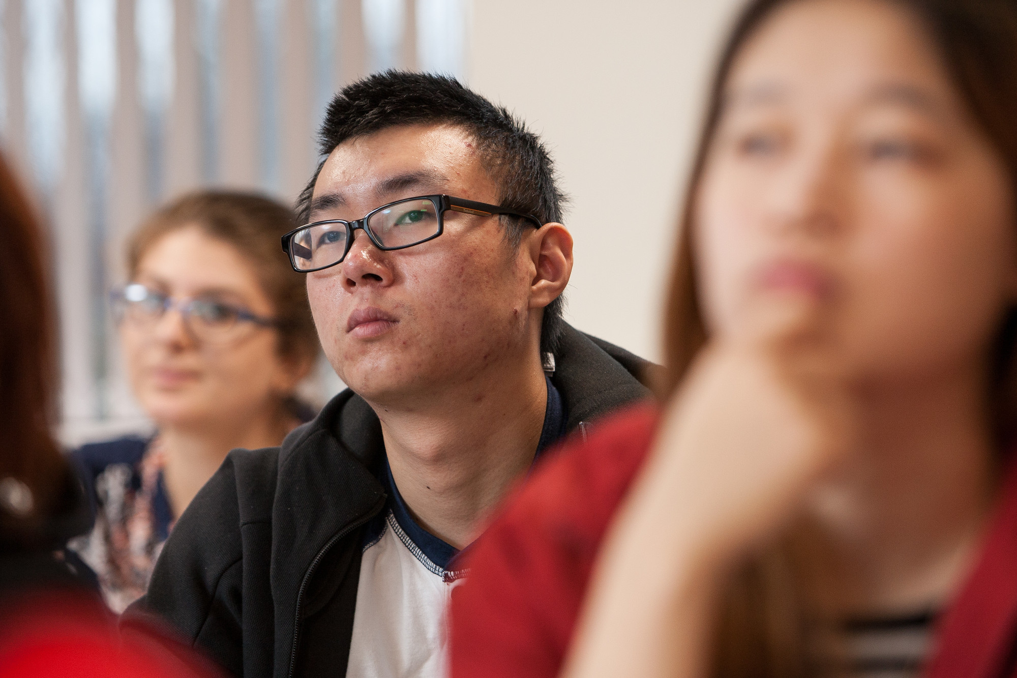 Students looking focused during a Marketing lecture