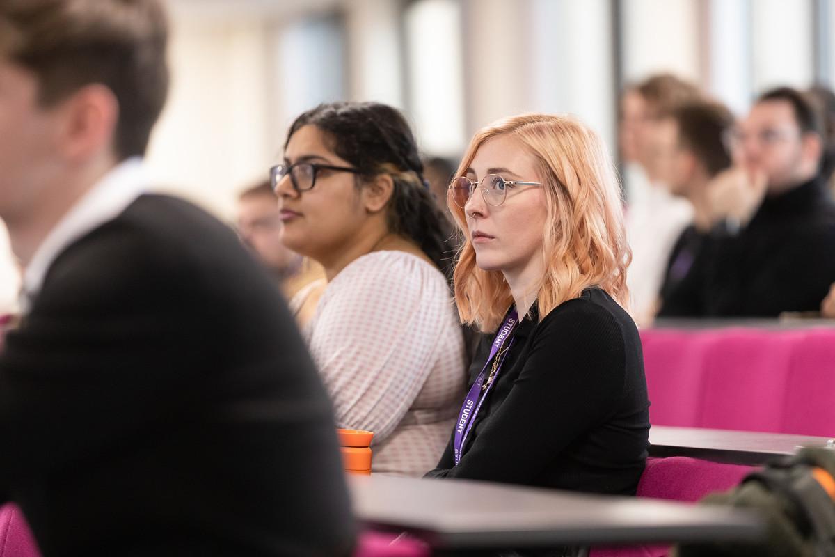 Students attentively engaged in a university lecture, representing the focus, professionalism, and advanced learning environment of the Business Management and Administration BA (Hons) (Level 6 only) degree.