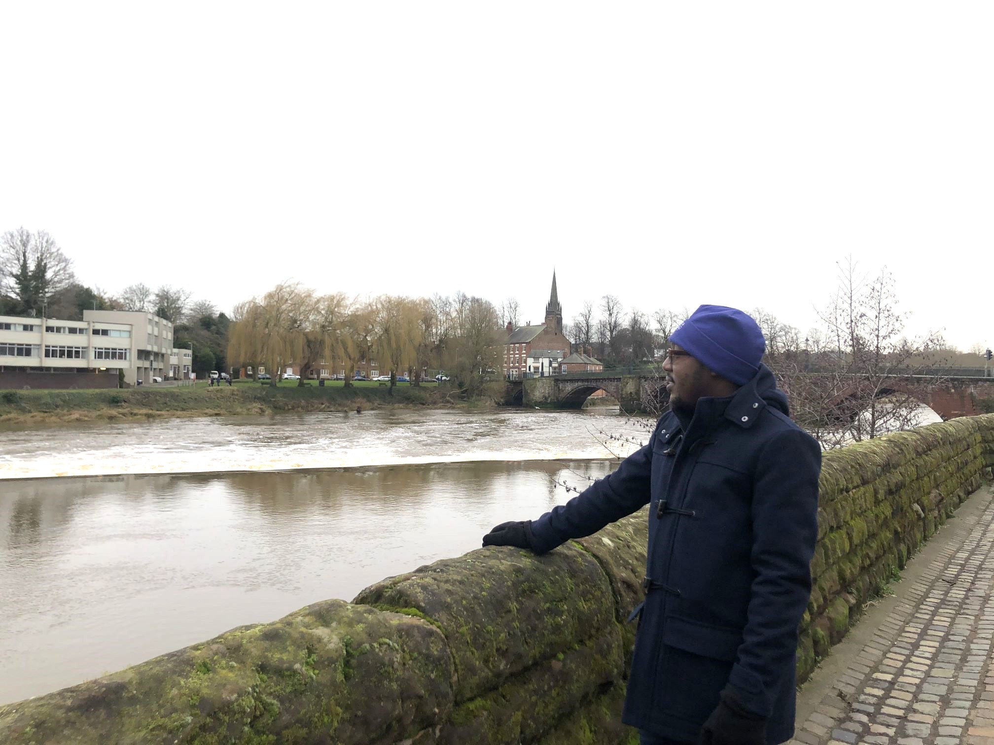 Former Master's student Abdulaziz stood overlooking Chester's River Dee
