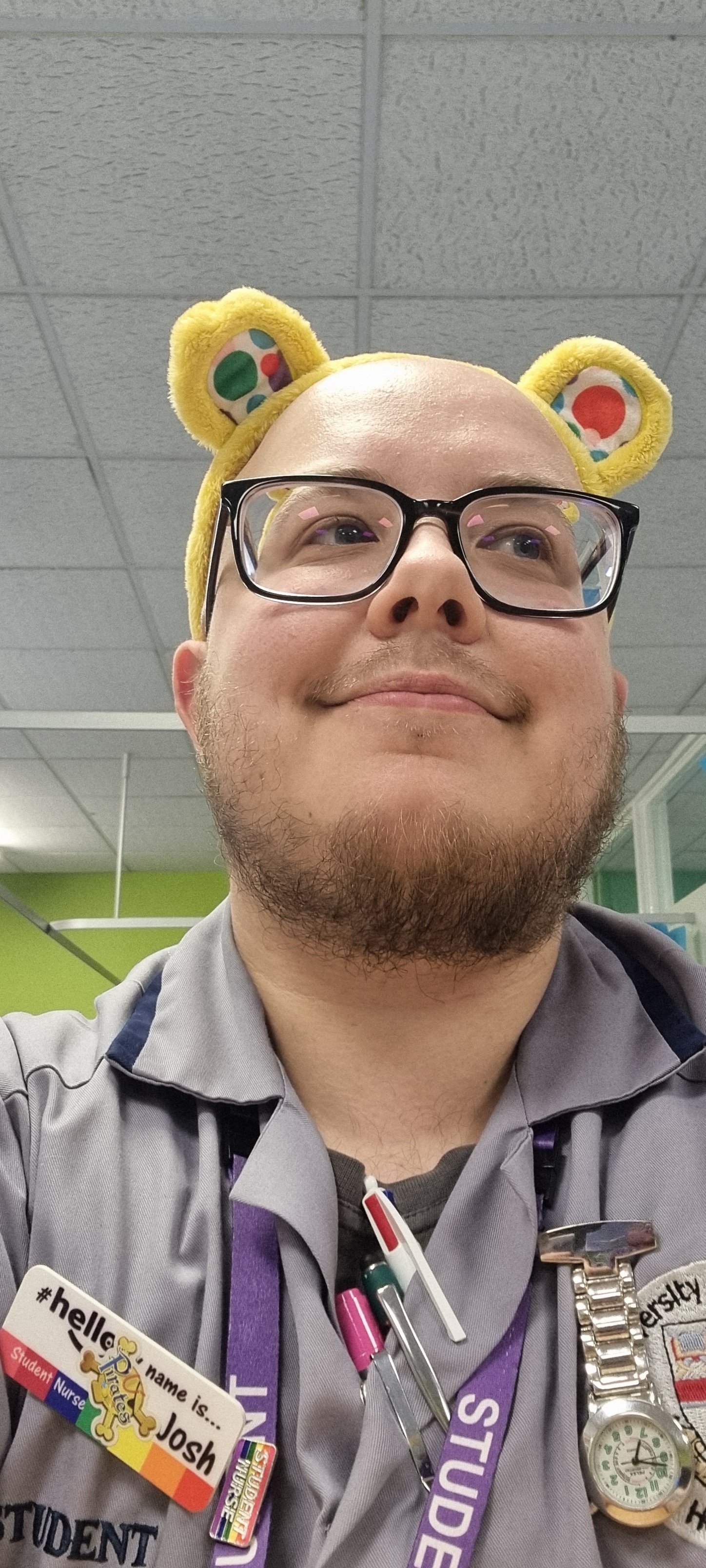 A nursing student wearing 'Pudsey Bear' ears for Children in Need