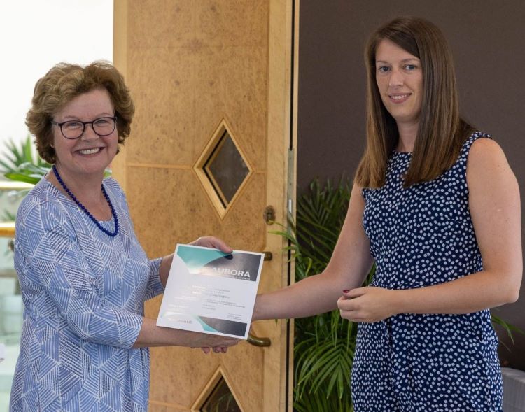 Dr Michelle Cordingley receiving her Aurora certificate from the University of Chester's Vice-Chancellor, Professor Eunice Simmons