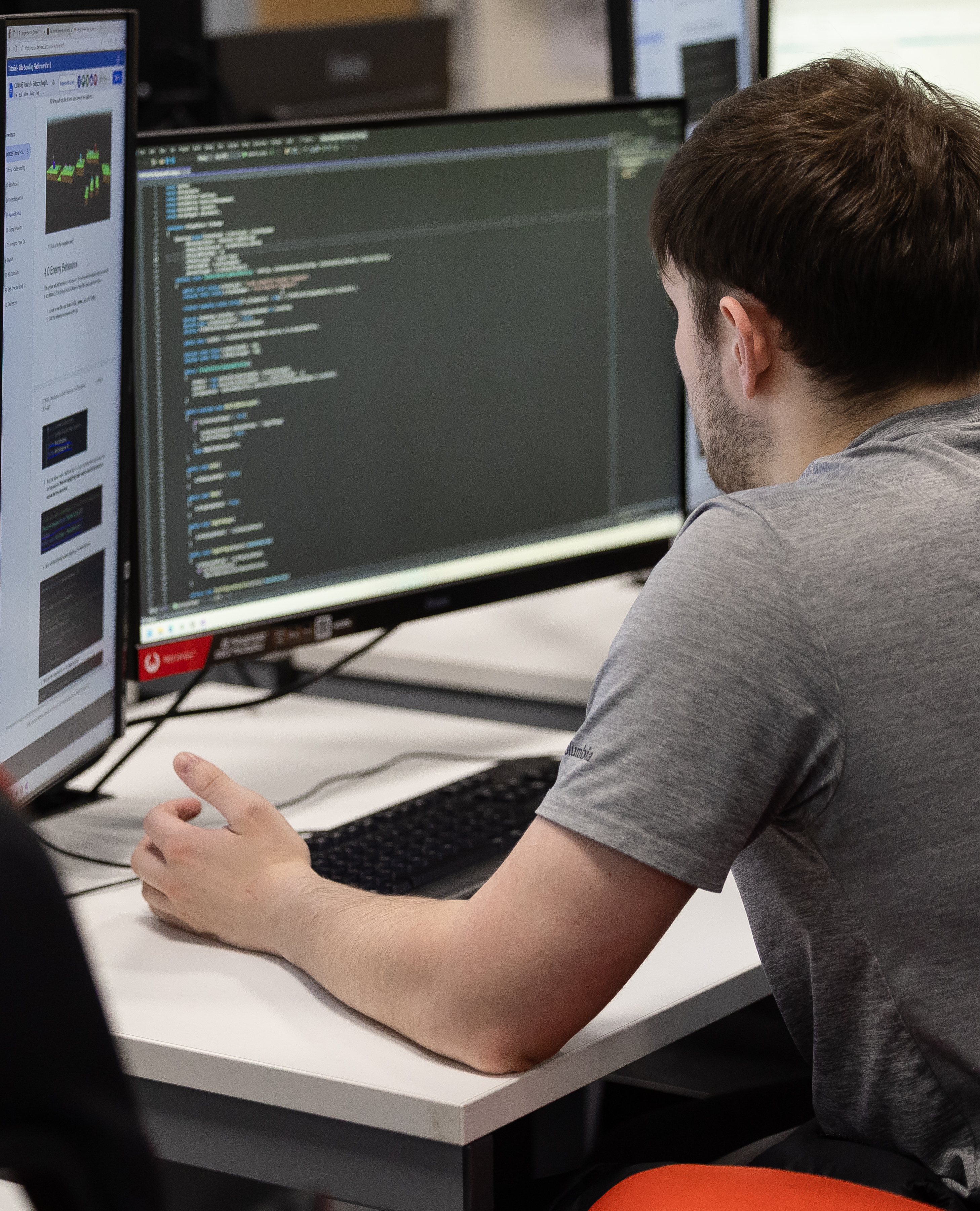 Student looking at computer code