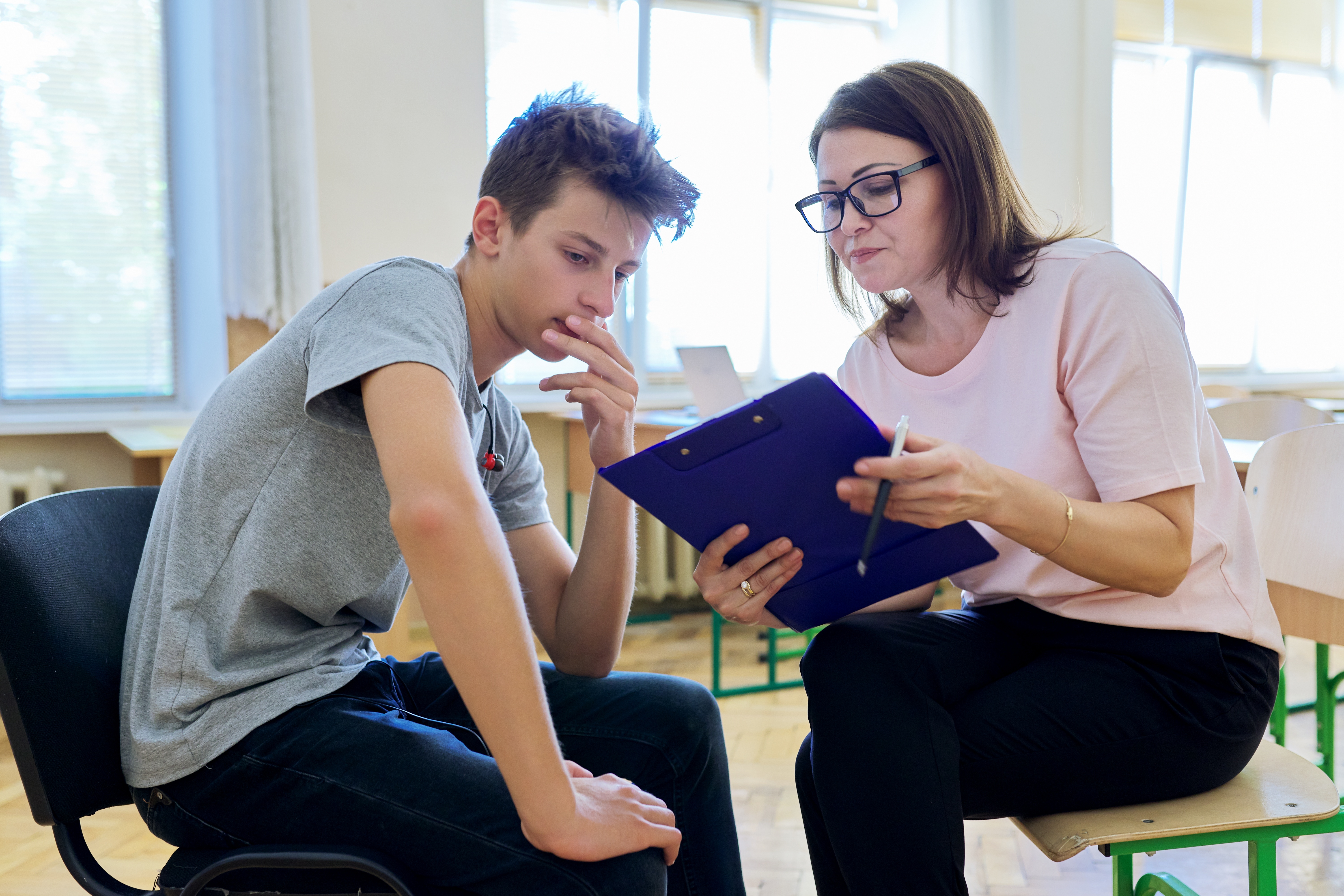A counsellor with a young adult
