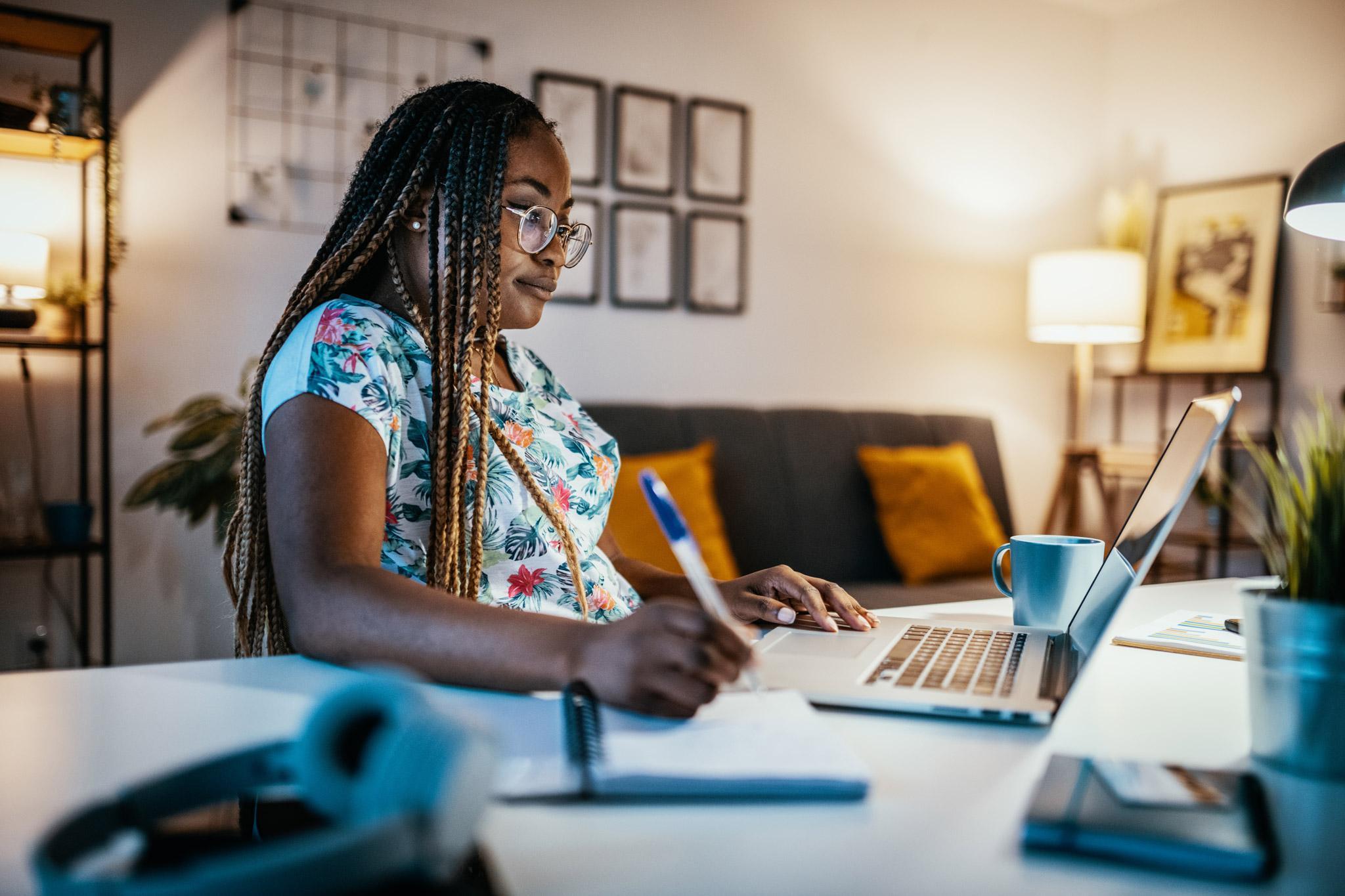 Student works on a laptop in a digital learning environment, developing computing, programming and technology education skills for the Secondary Computing (School-Led) PGCE with QTS at the University of Chester.