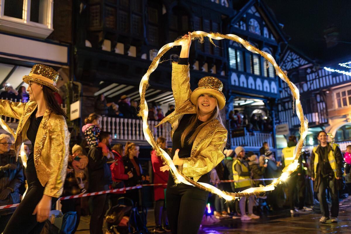 Events Management and Marketing BA (Hons) students coordinating a vibrant city parade, showcasing creative event planning and promotional skills during a live public celebration.