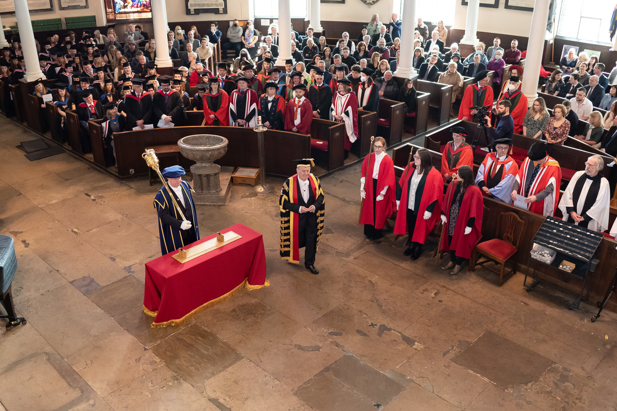 The Chancellor walks in to the graduation ceremony at UCS