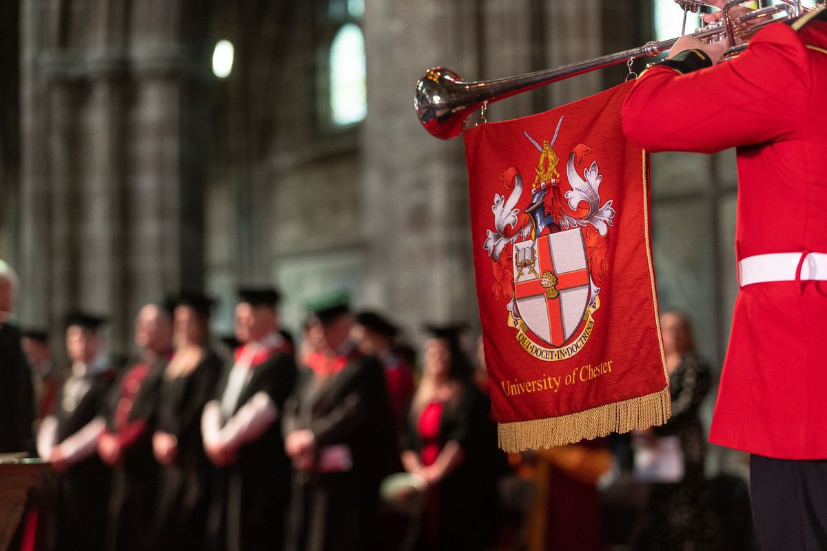 university crest on flag