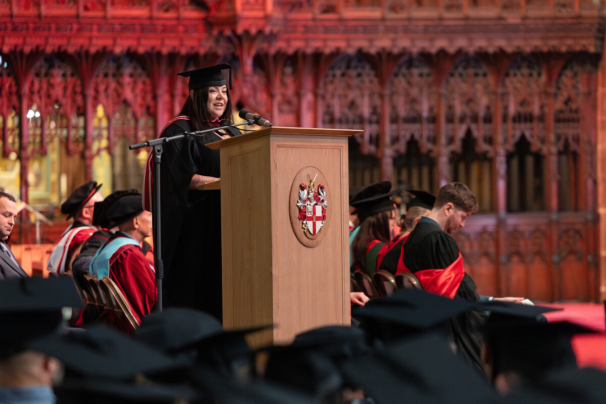 Graduate speaking at ceremony