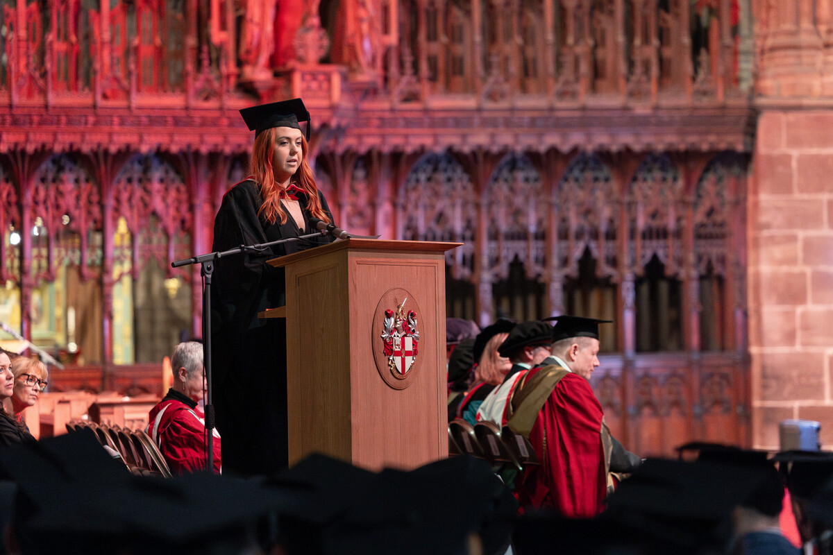Graduate speaking at ceremony