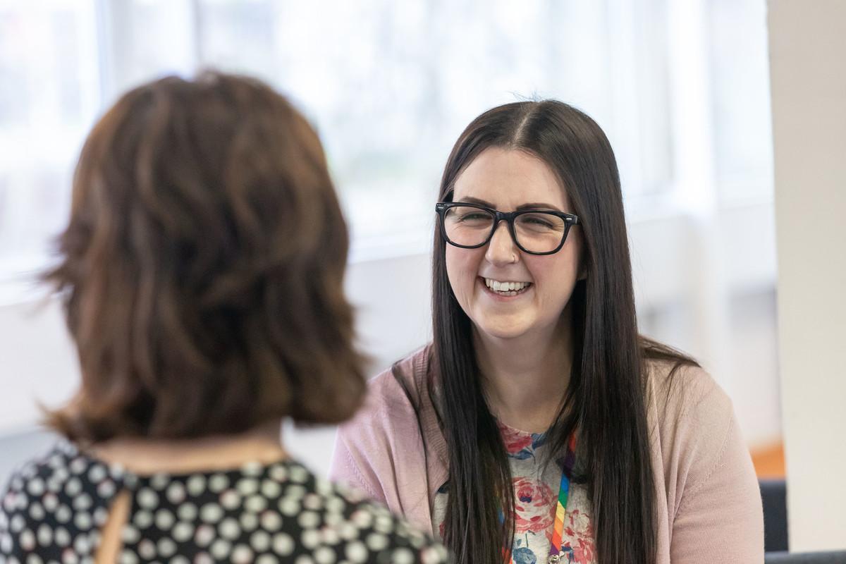 Nursing student in a supportive one-to-one discussion, representing the Pre-registration Mental Health Nursing MSc at the University of Chester.