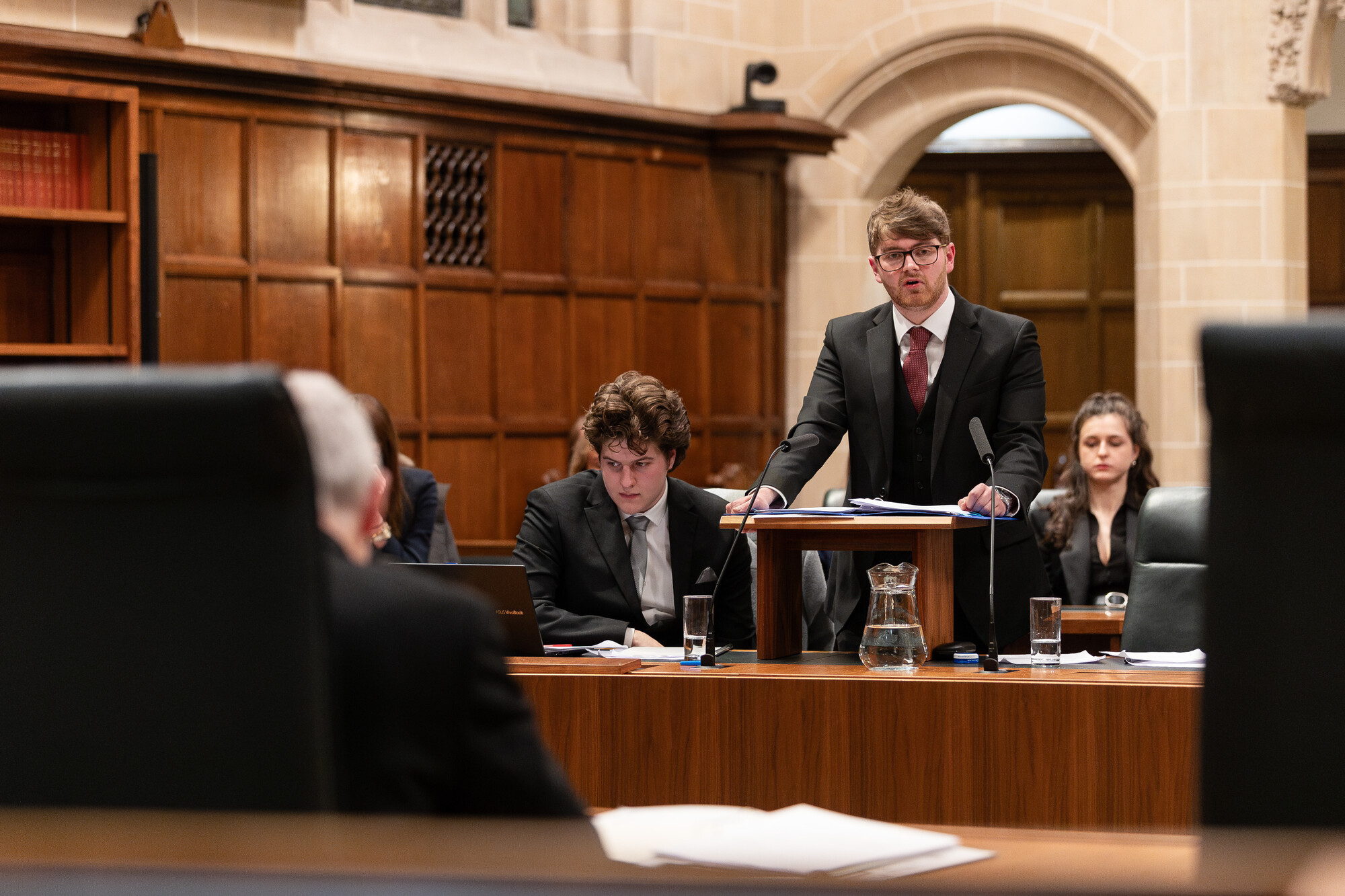 student standing at podium