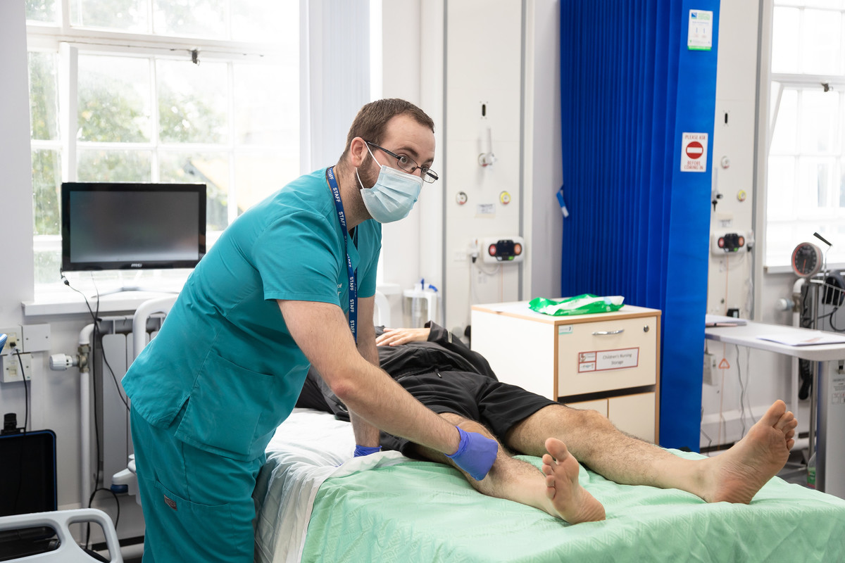 A student with a patient