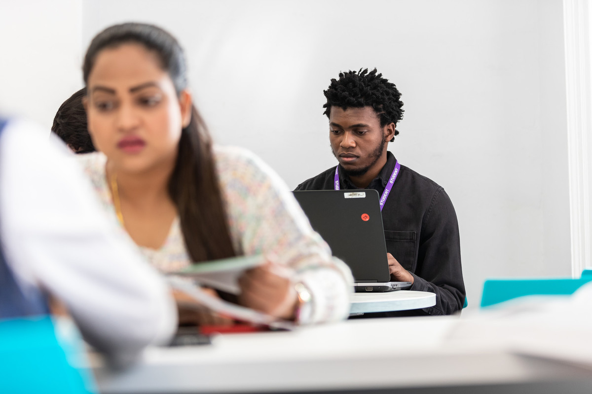 A student uses a laptop
