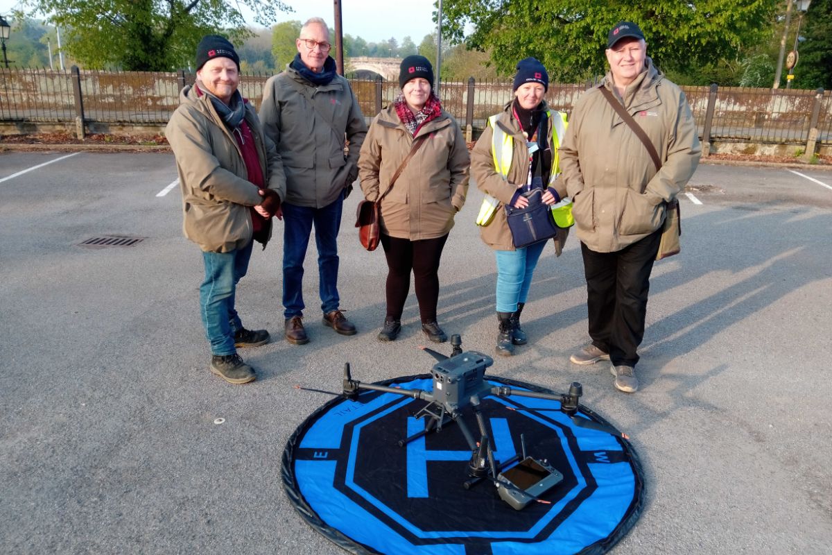 English Heritage volunteers with the drone scanning technology.