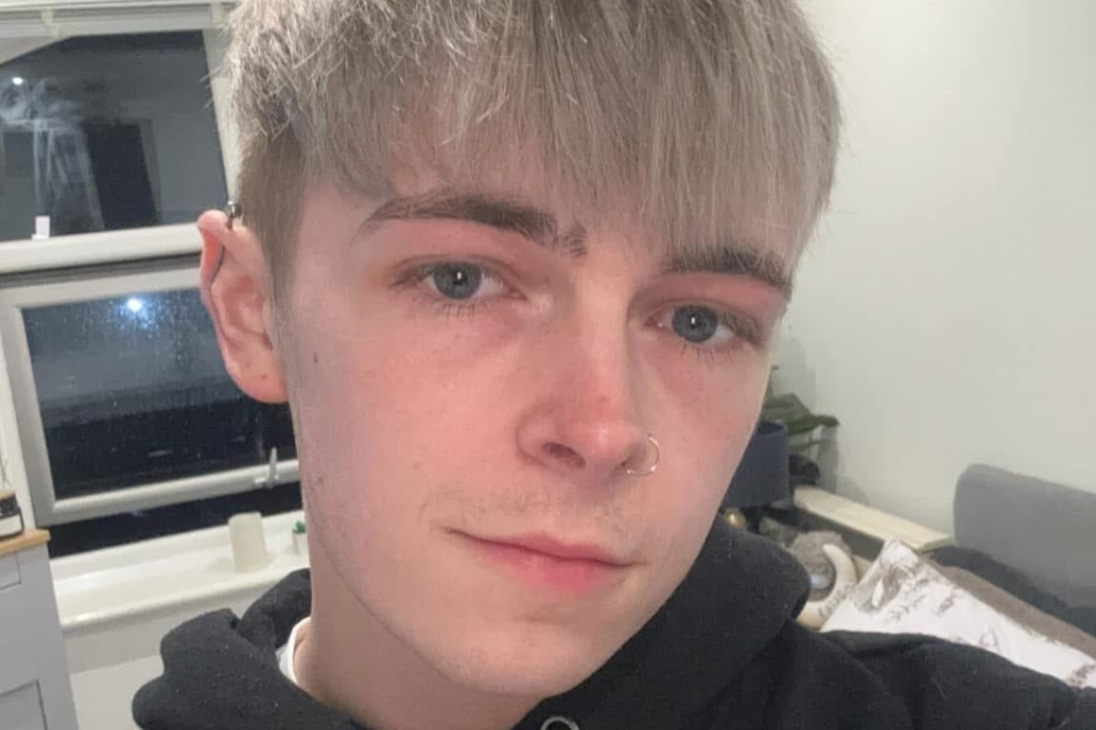 A close-up headshot of Sam Finlay looking at the camera.