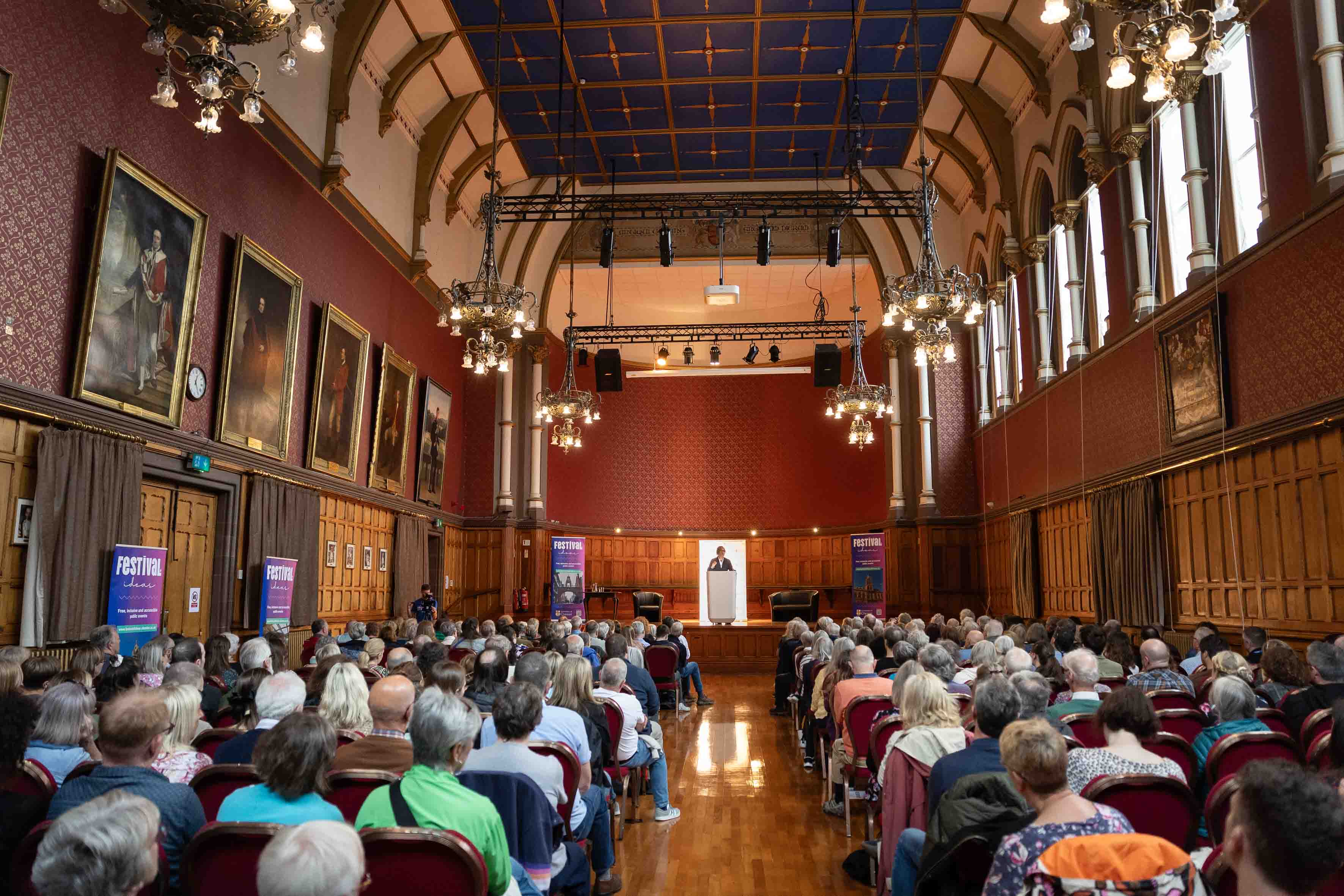The audience hearing from Professor David Olusoga.