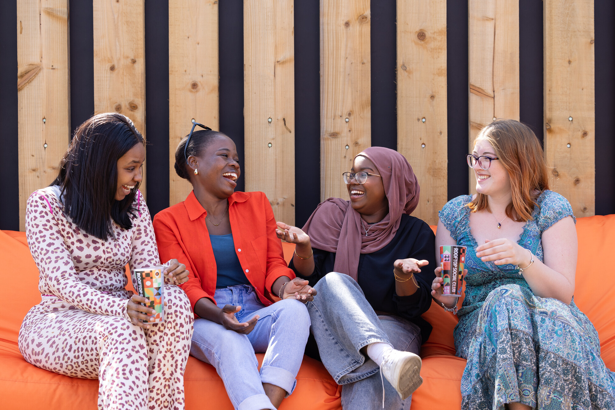 Students chatting and laughing together.
