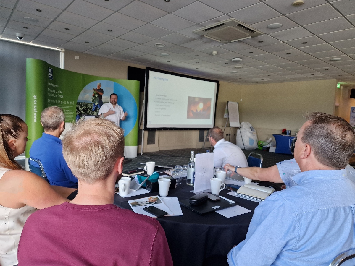 Sam Chadwick sharing his expertise on AI at the Yara Summer Conference.