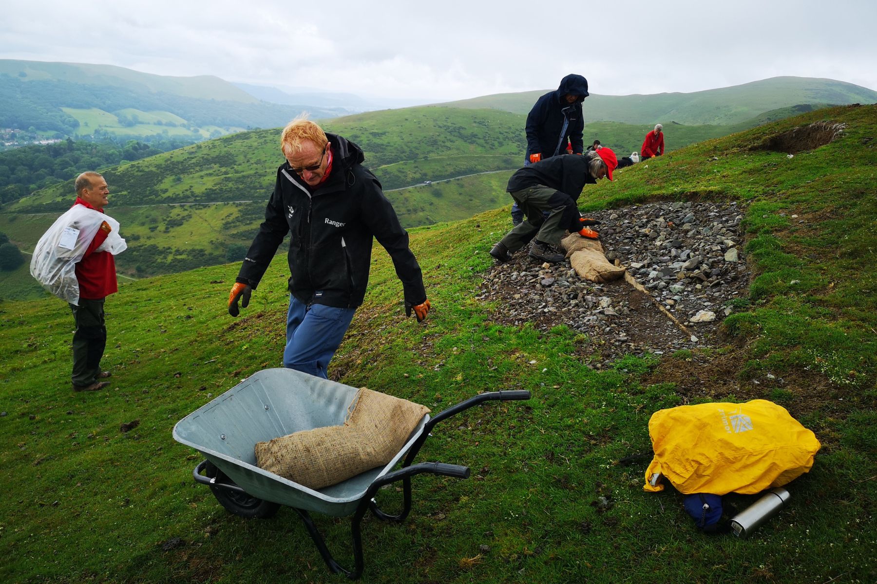 Volunteers repairing erosion damage on Bodbury Ring. Credit Patrick Edwards.