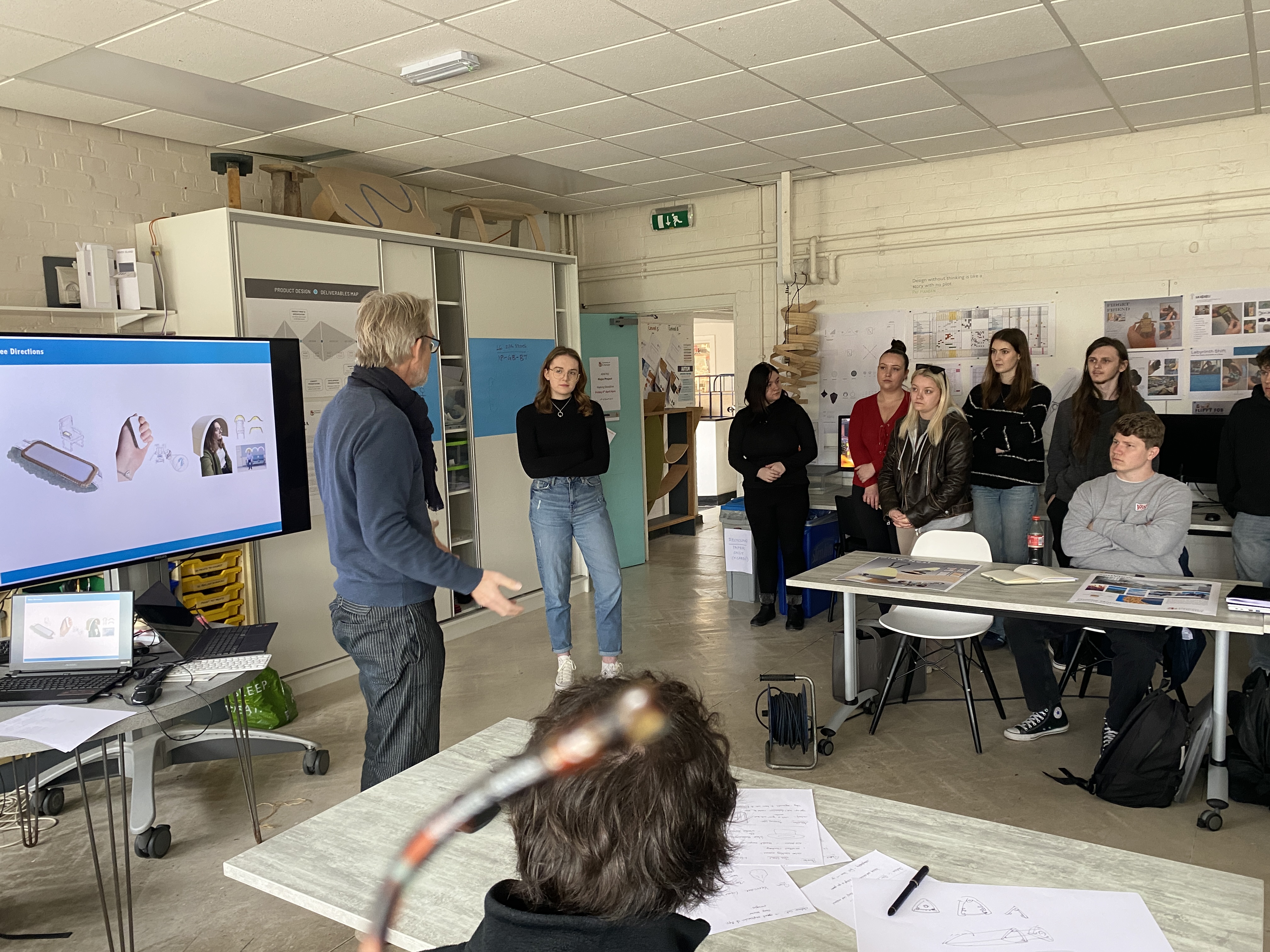 students being shown designs