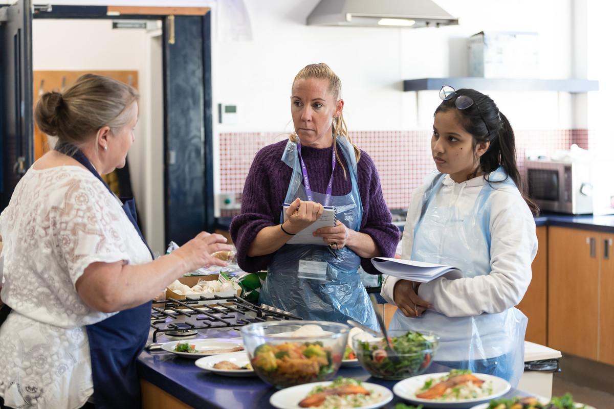 Students take part in a practical nutrition workshop, preparing and evaluating healthy meals to support public health, dietary education and community wellbeing on the Public Health Nutrition MSc at the University of Chester.