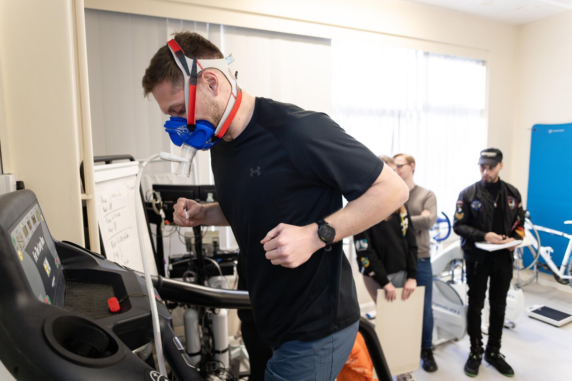 Exercise and Nutrition Science MSc student completing a treadmill fitness assessment in a sports science laboratory, using physiological testing equipment to analyse exercise performance and health outcomes.