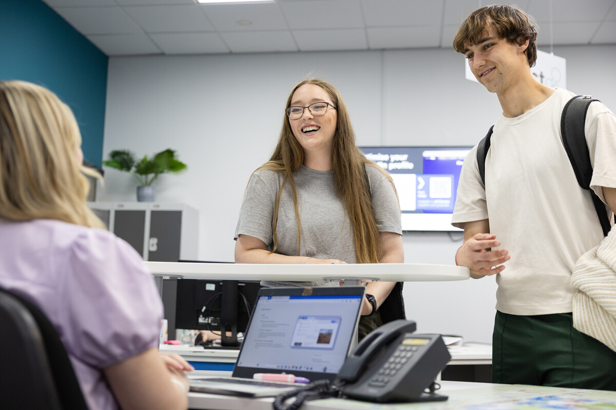 Students smiling at binks reception