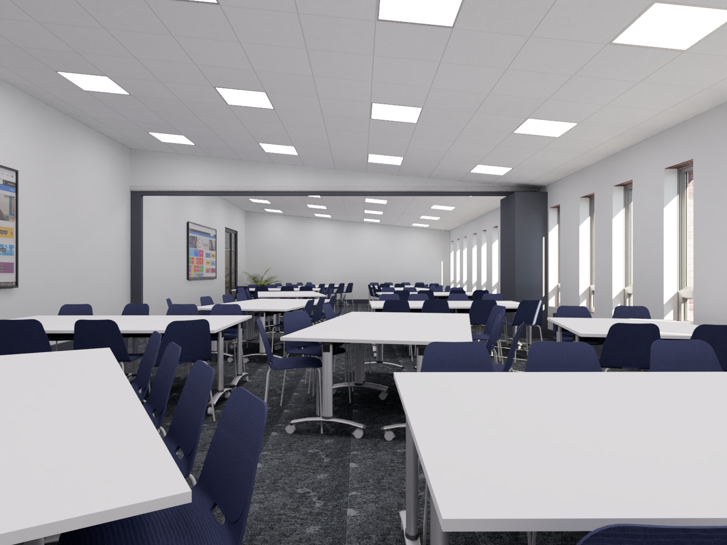 Modern classroom with white tables and blue chairs arranged for group learning.