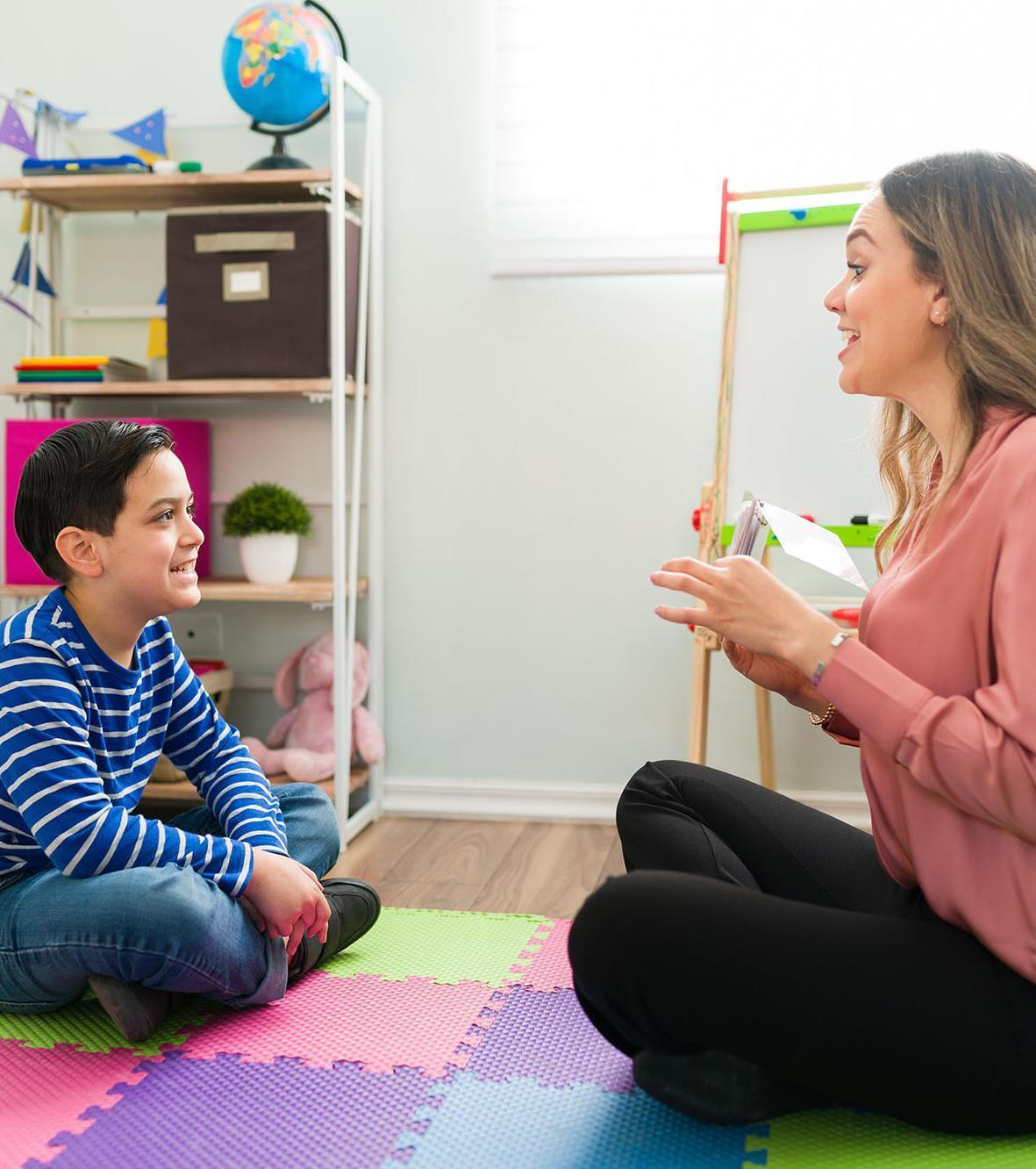 Family and Child Psychology MSc student engaging in child-centred therapeutic interaction, exploring child development, family relationships and psychological wellbeing in a supportive learning environment.