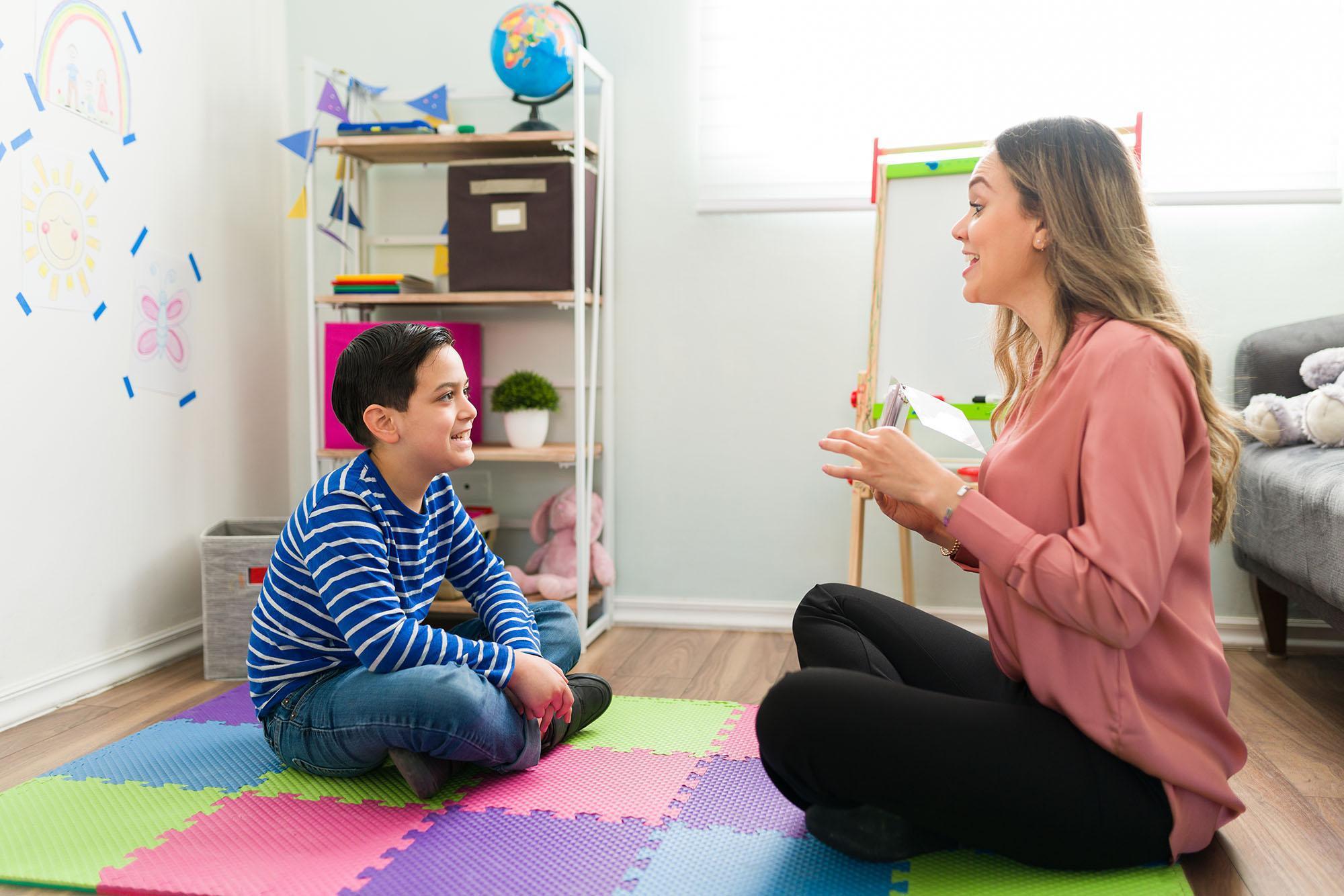 Family and Child Psychology MSc student engaging in child-centred therapeutic interaction, exploring child development, family relationships and psychological wellbeing in a supportive learning environment.