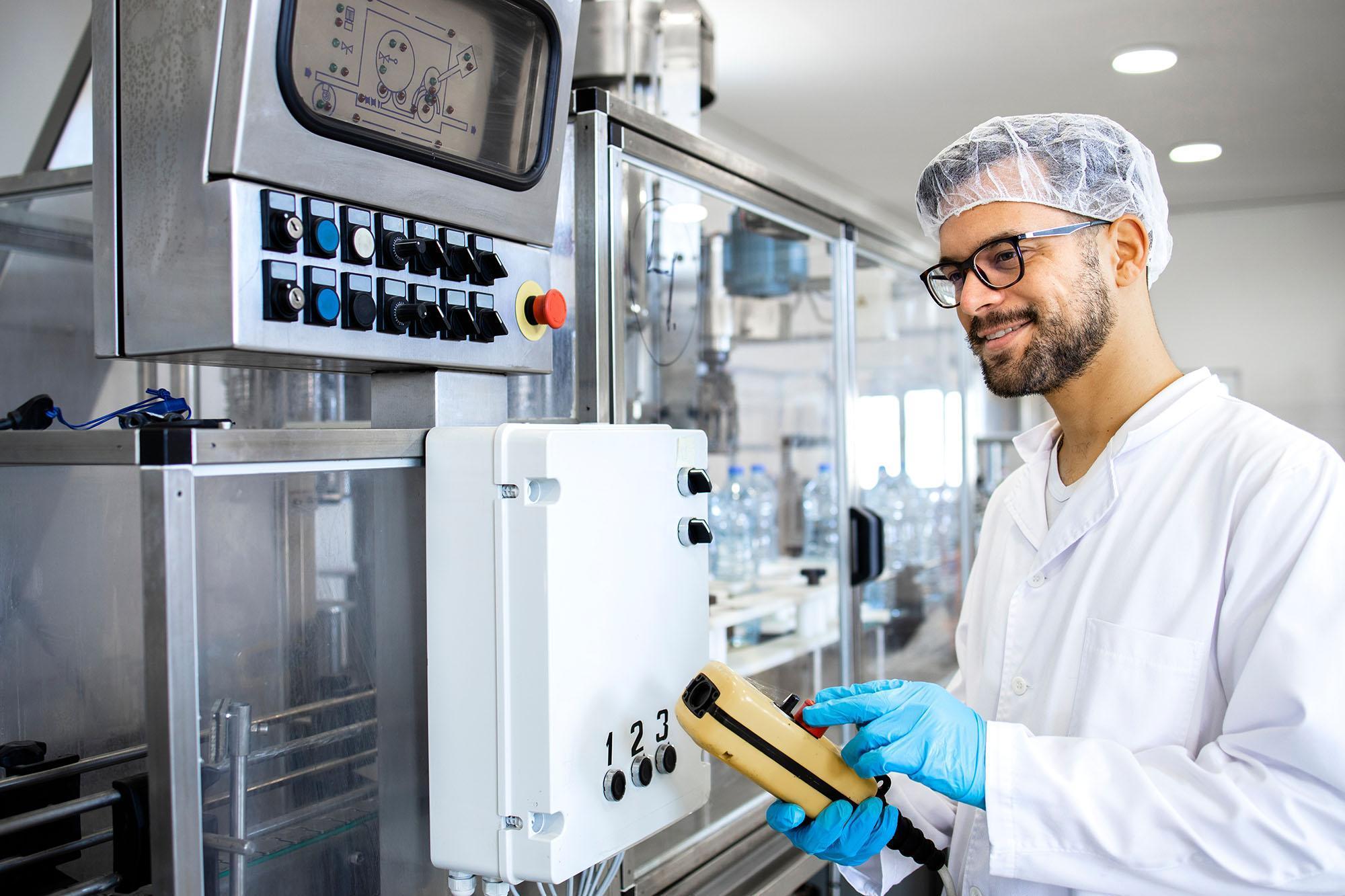 Food Innovation MSc student operating advanced food processing equipment in a food science laboratory, demonstrating food product development, food manufacturing technology, quality assurance, and innovation within the food industry.