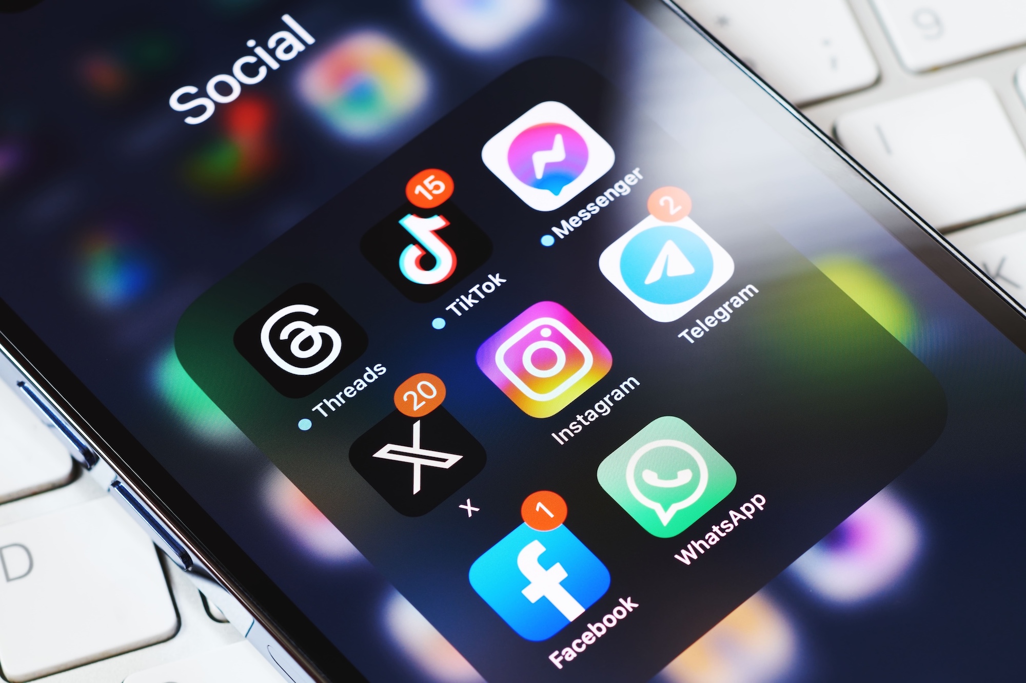 social media app icons on a smartphone screen