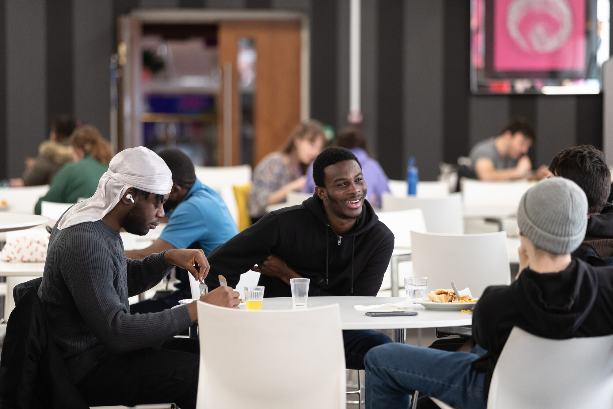 Group of students at a catering outlet