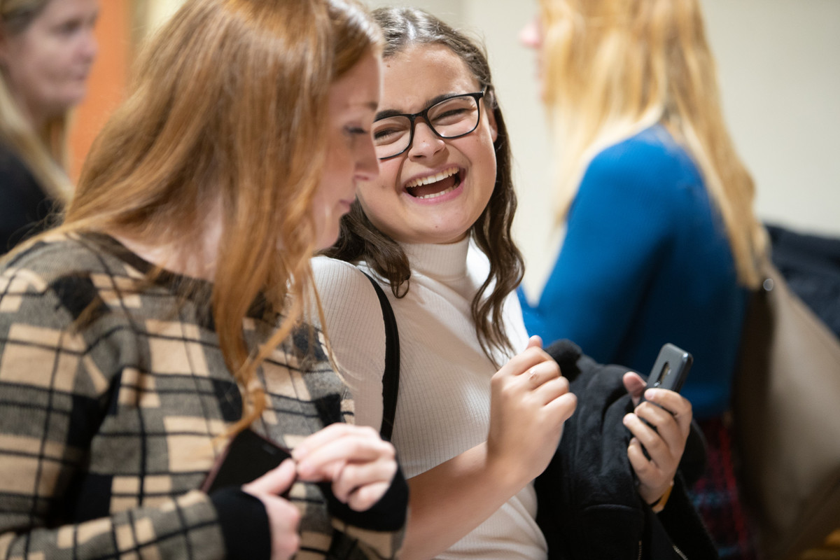 Two students talking together