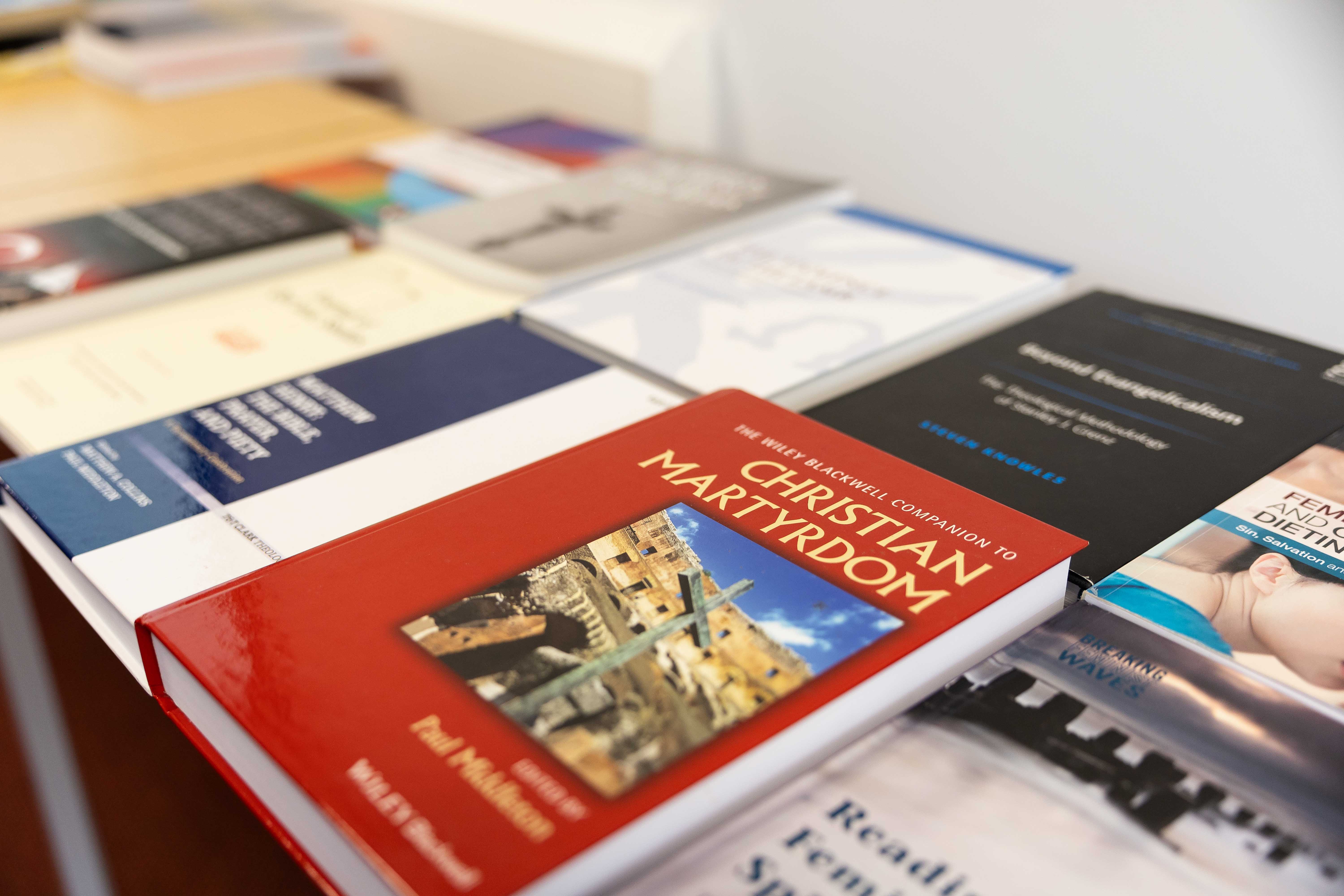 Theological books on a table