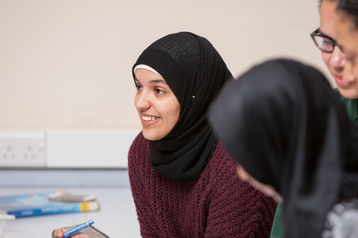 A student taking part in a class