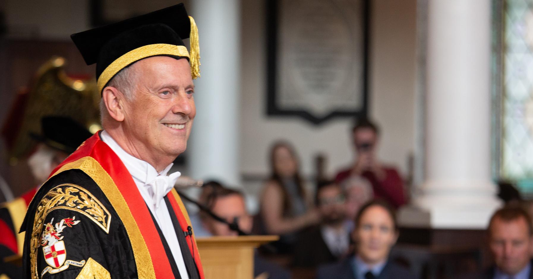 Gyles Brandreth photographed at a Graduation ceremony